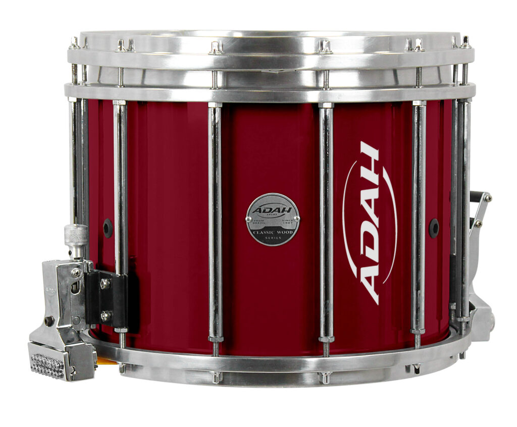 Instrumento de percussão marcial, caixa de alta tensão